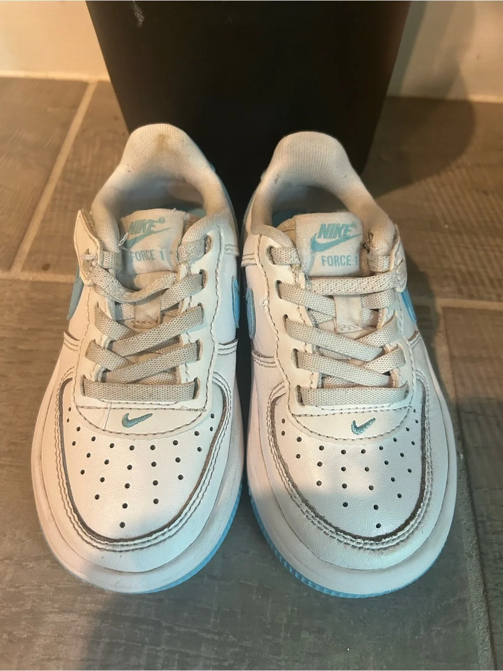 Nike Kids White Sneakers with Light Blue Accents